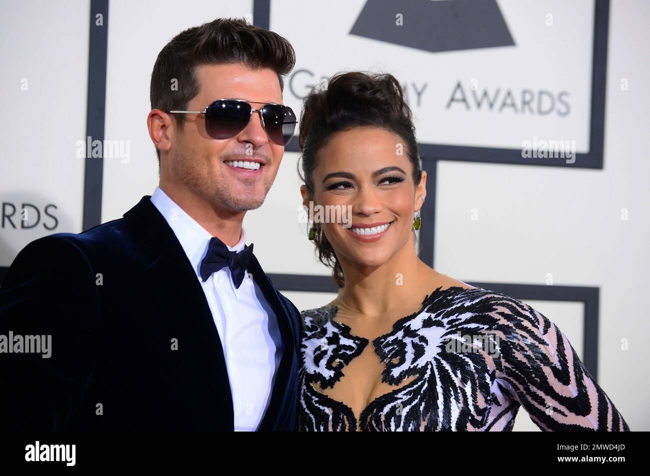 FILE This Jan. 26, 2014 file photo shows Robin Thicke, left, and(01)