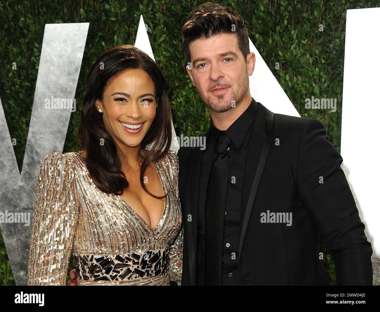 FILE In this Feb. 24, 2013 file photo, Paula Patton and Robin Thicke