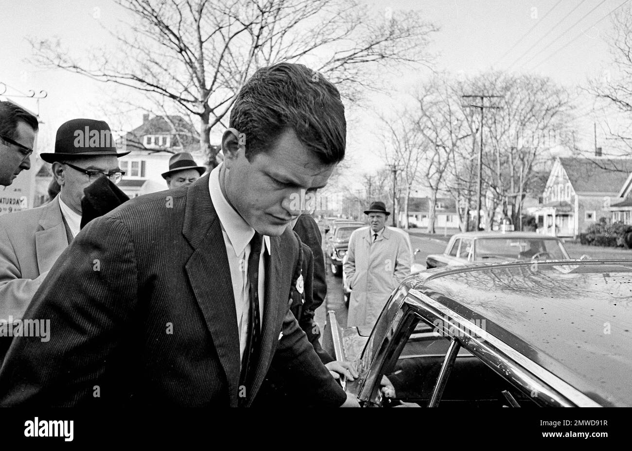 Sen. Edward M. Kennedy enters a limousine after a Mass had been