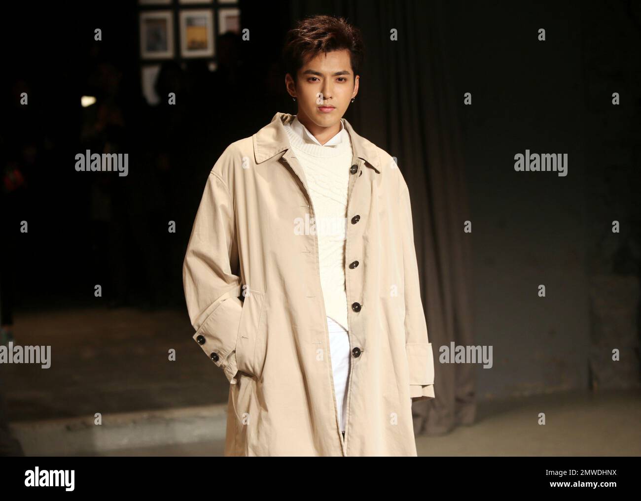 Chinese actor Kris Wu poses at a promotional conference for his