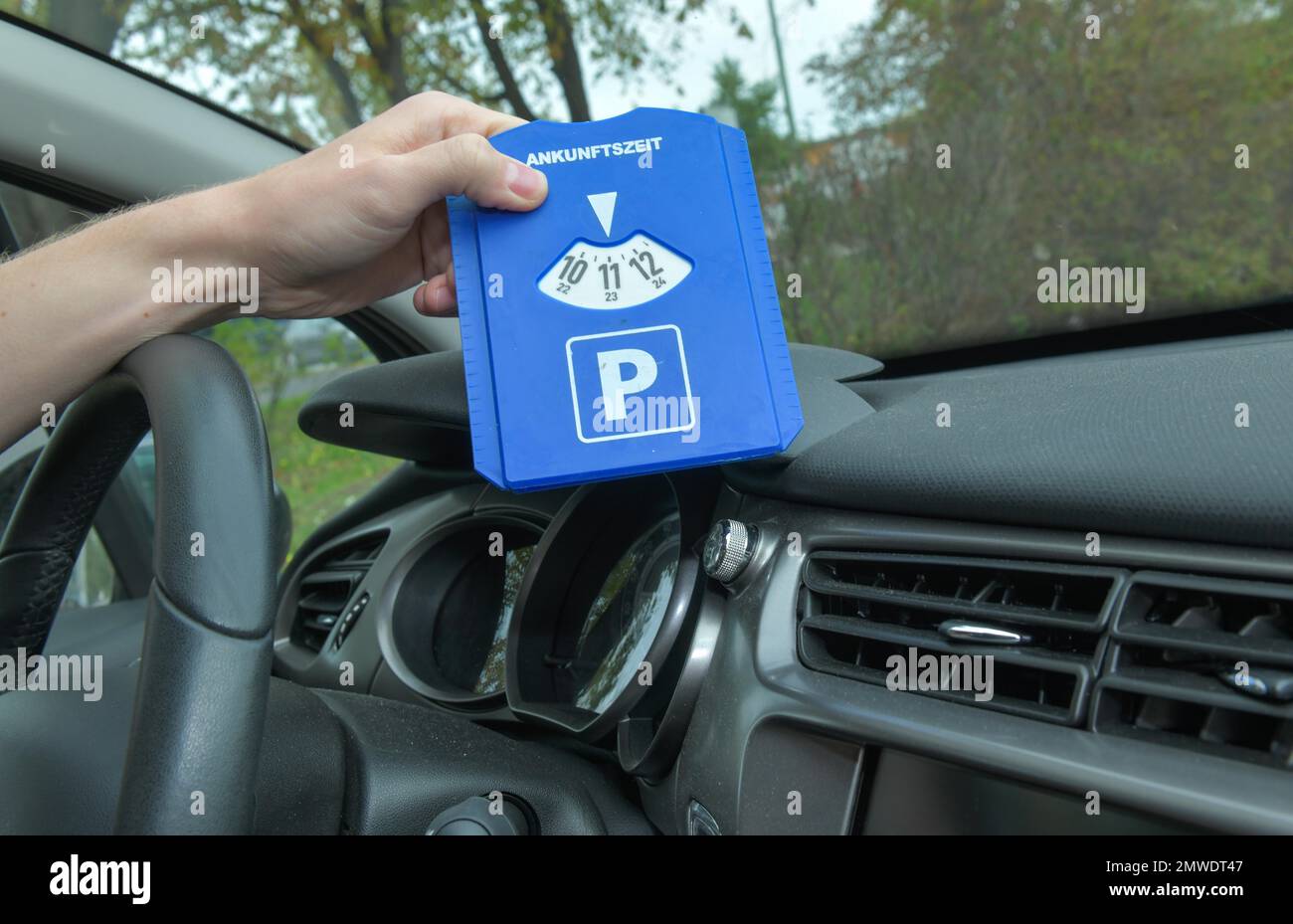Parking disc, car Stock Photo - Alamy