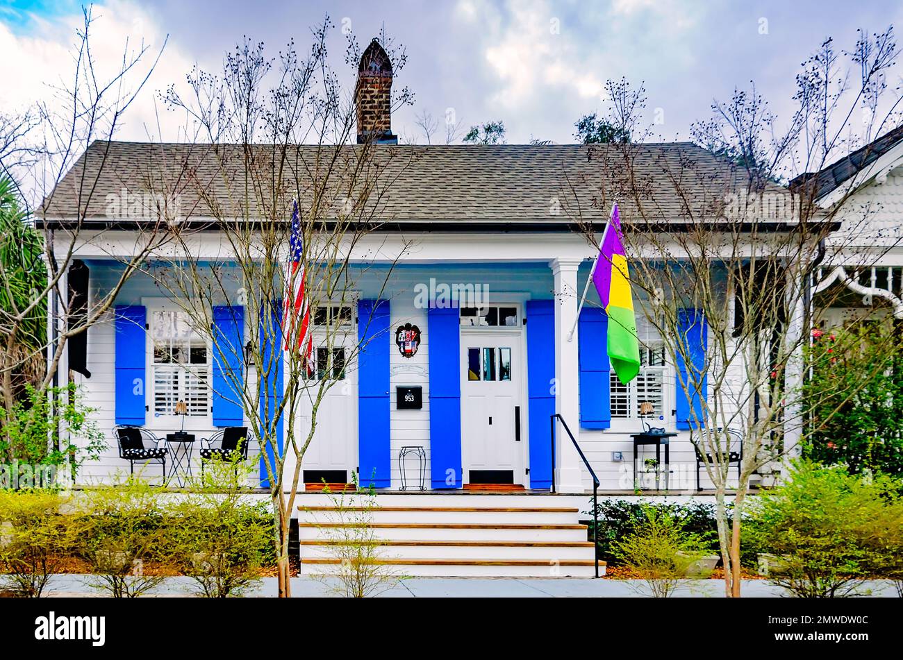 A Creole cottage is decorated for Mardi Gras on Augusta Street, Jan. 30, 2023, in Mobile, Alabama. The cottage was built in 1852. Stock Photo