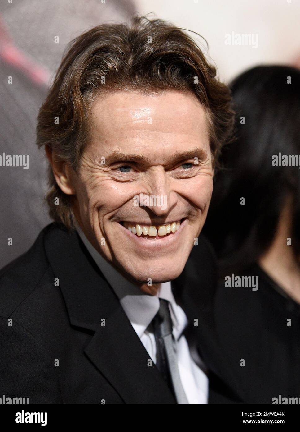 Willem Dafoe, a cast member in "The Great Wall," poses at the premiere
