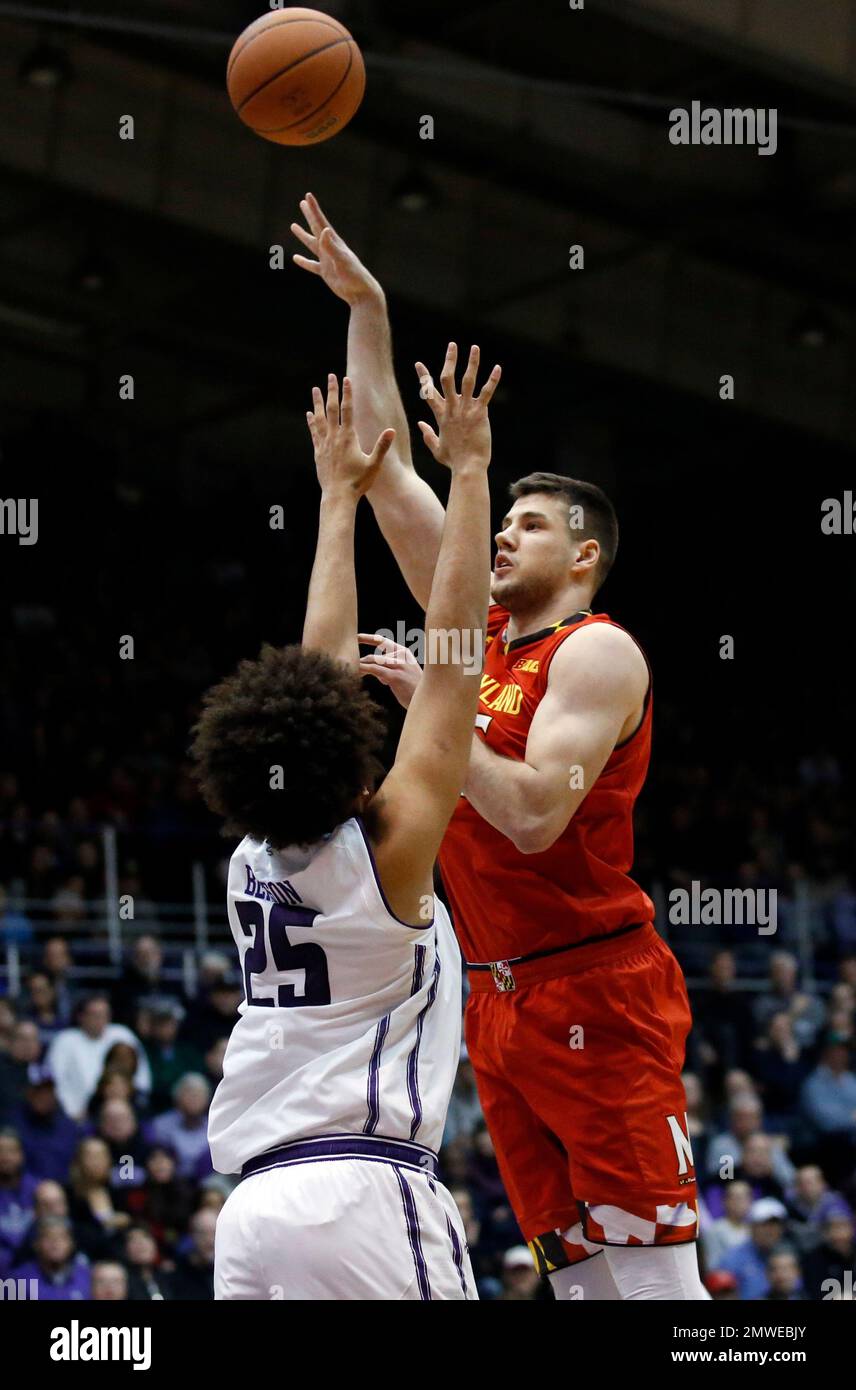 Maryland center Michal Cekovsky, right, shoots over Northwestern center  Barret Benson during the first half of an NCAA college basketball game  Wednesday, Feb. 15, 2017, in Evanston, Ill. (AP Photo/Nam Y. Huh