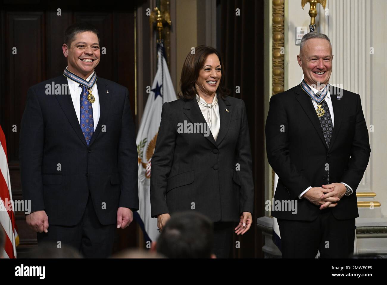 Washington, United States of America. 31 January, 2023. U.S Vice President Kamala Harris, center, stands with former NASA astronaut Douglas Hurley, right, and Robert Behnken, left, after awarding them the Congressional Space Medal of Honor during a ceremony in the Indian Treaty Room of the Eisenhower Executive Office Building at the White House, January 31, 2023 in Washington, DC Hurley and Behnken were awarded the medal for bravery in the NASA SpaceX Demonstration Mission-2 to the International Space Station. Credit: Joel Kowsky/NASA/Alamy Live News Stock Photo
