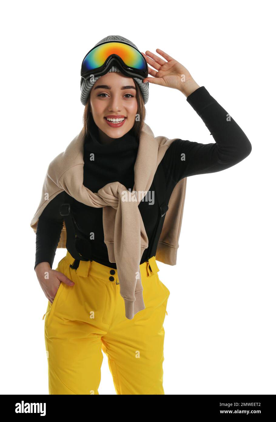Woman wearing stylish winter sport clothes on white background Stock