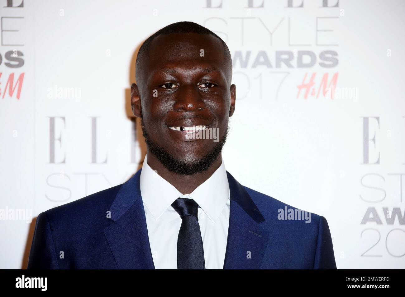 British hip hop artist Stormzy poses for photographers upon arrival at