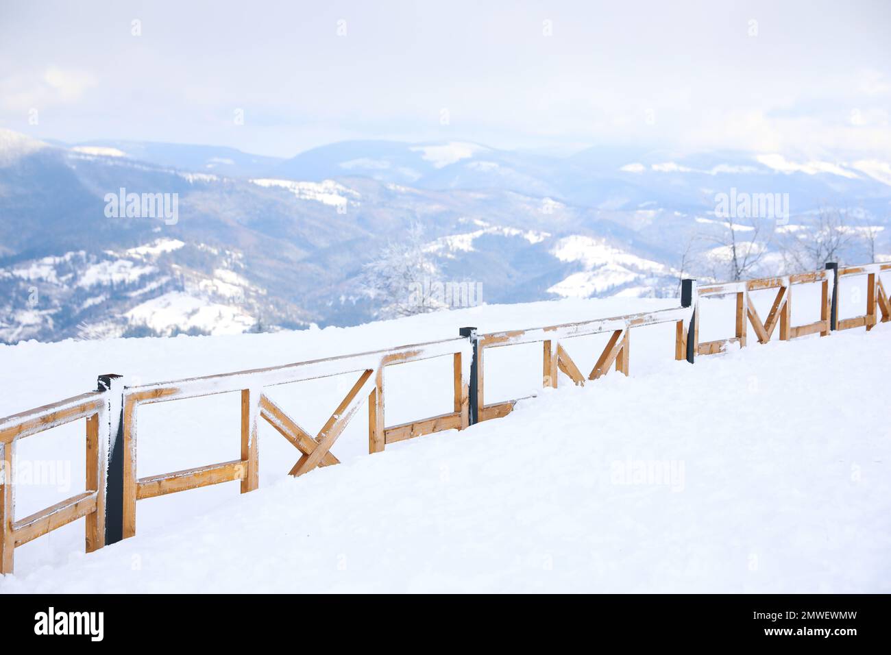 Picturesque view of snowy hills at mountain resort Stock Photo - Alamy