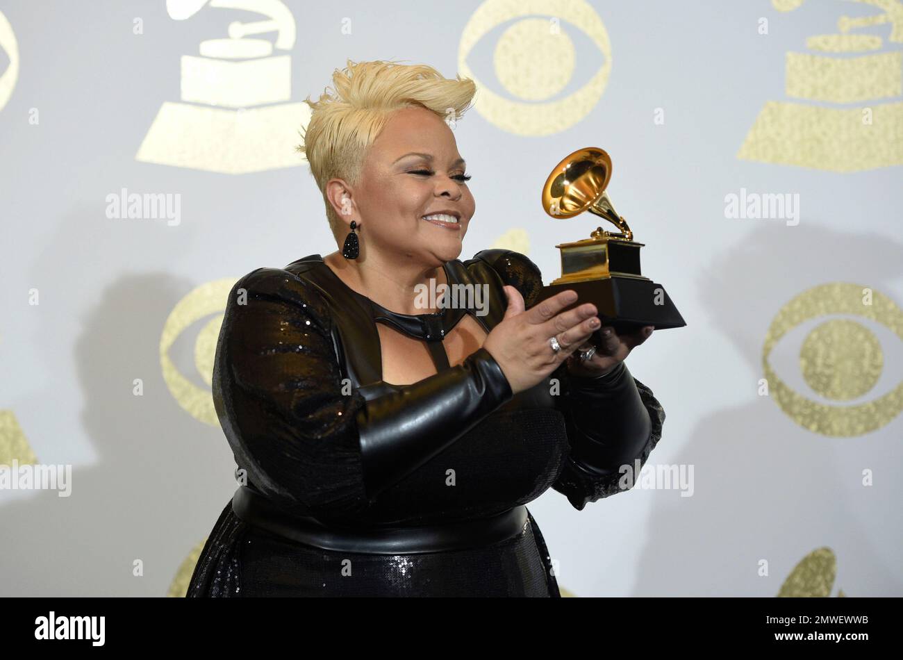Tamela Mann poses in the press room with the award for best gospel