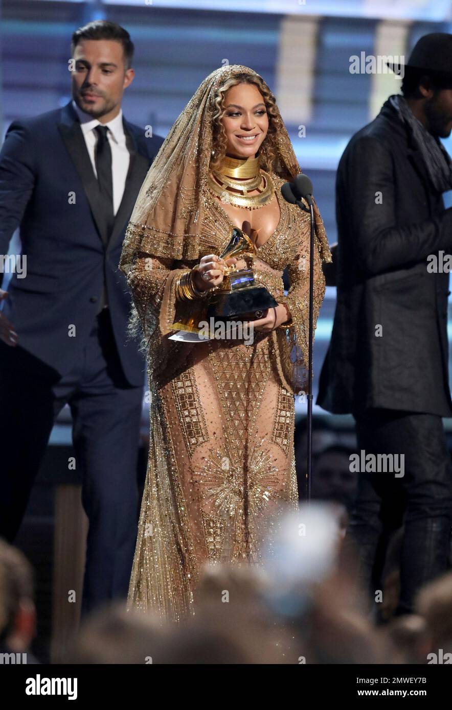 Beyonce accepts the award for best urban contemporary album for ...