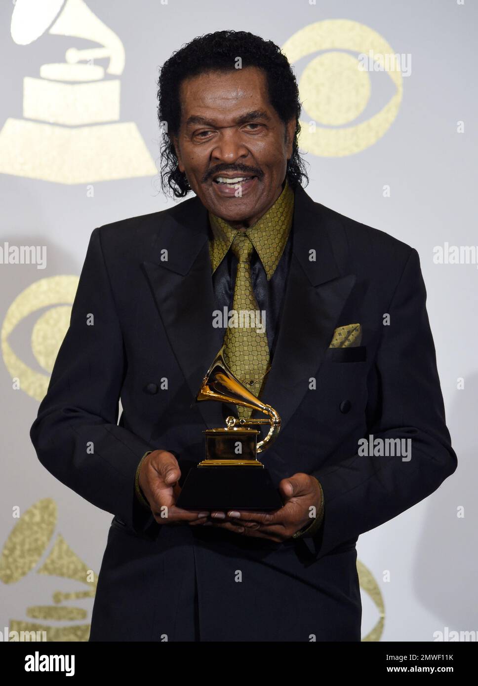 Bobby Rush poses in the press room with the award for best traditional