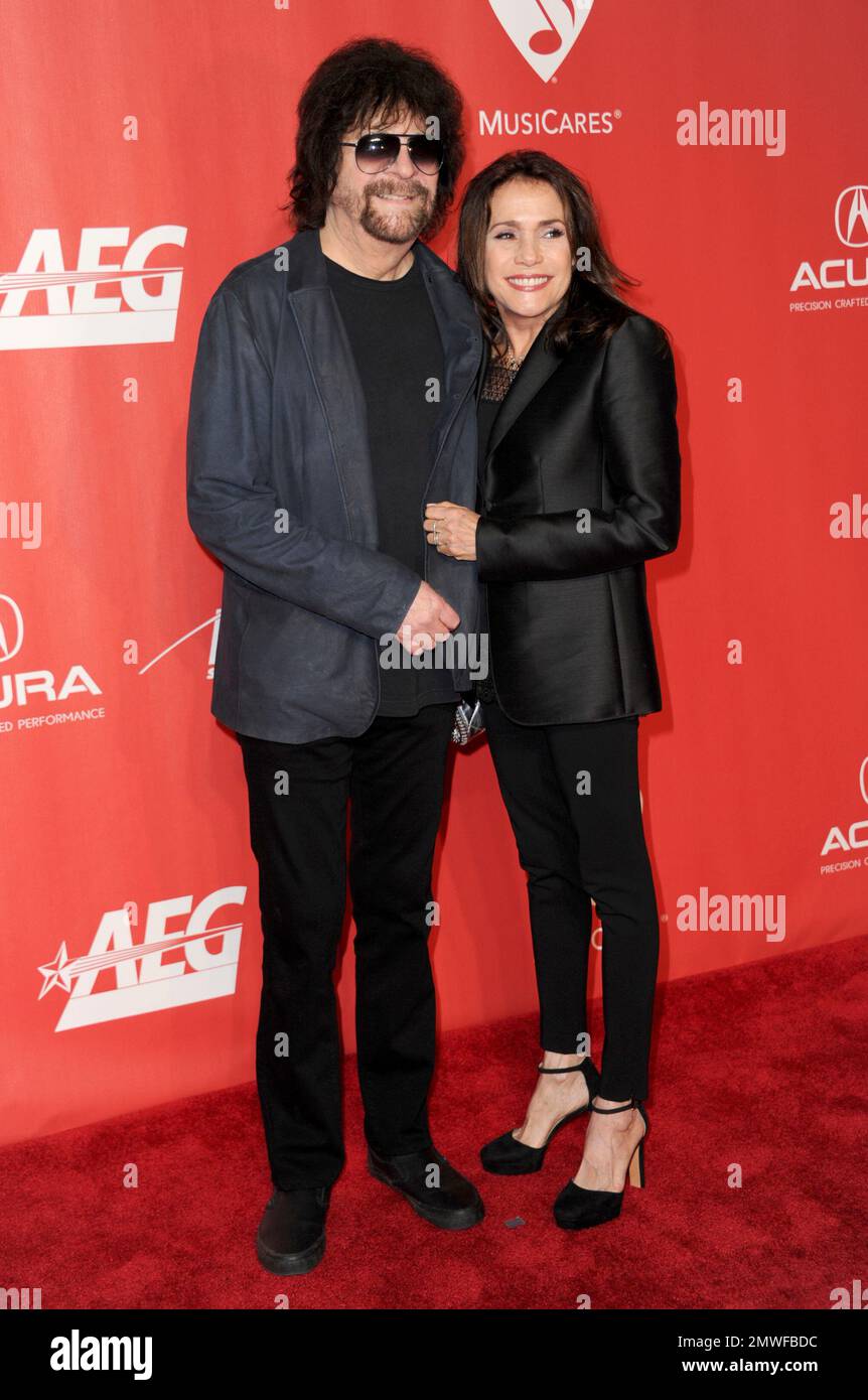 Jeff Lynne, left, and Camelia Kath arrive at the MusiCares Person of the Year tribute honoring