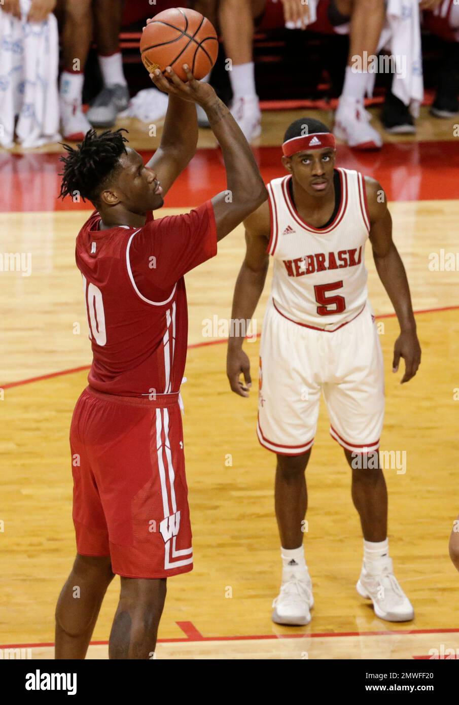 Nebraska's Glynn Watson Jr. (5) watches as Wisconsin's Nigel Hayes (10