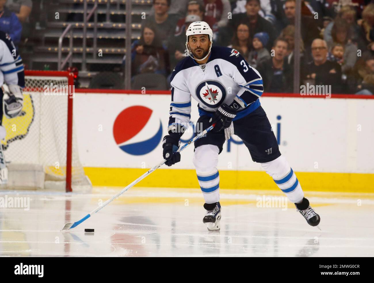 Winnipeg Jets defenseman Dustin Byfuglien (33) skates against the New Jersey  Devils during the third period of an NHL game, Tuesday, March 28, 2017, in  Newark, N.J. (AP Photo/Julio Cortez Stock Photo - Alamy