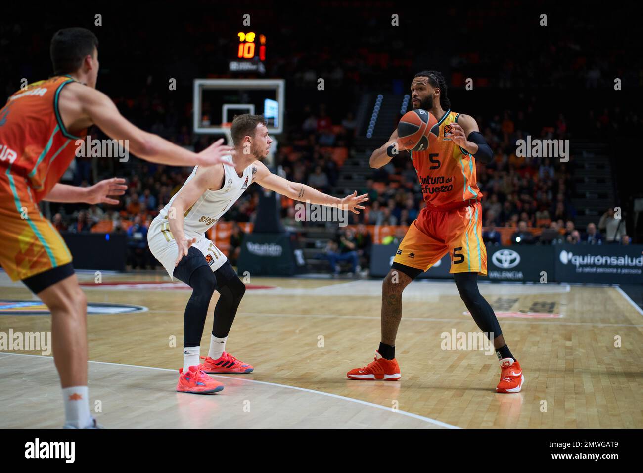 Valencia, Spain. 31st Jan, 2023. Jan Niklas Wimberg of FC Bayern Munich (C)  and James Web of Valencia basket (R) in action during the J22 Turkish  Airlines EuroLeague between Valencia Basket and