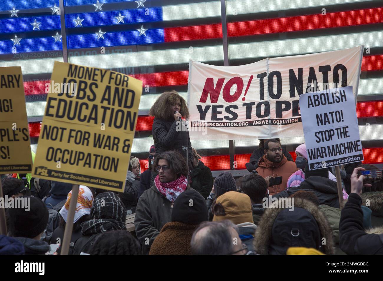 Peace activists and anti-militarists looking for negotiations in Ukraine rather than NATO escelating the war rally in Times Square in New York CIty during Martin Luther King Day weekend. Stock Photo