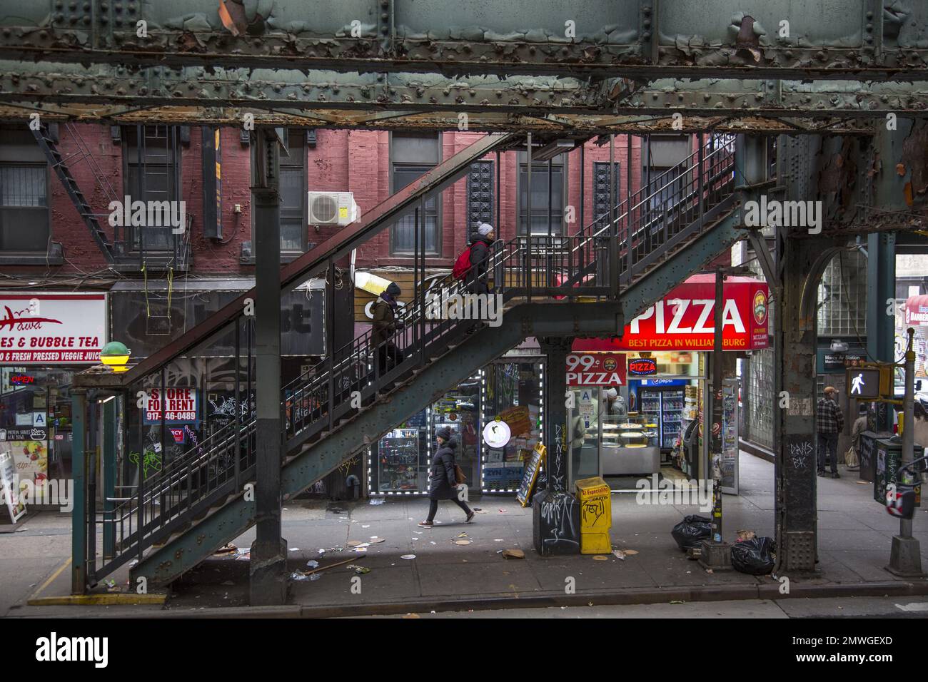 Elevated Marcy Avenue subway train station along Broadway in the