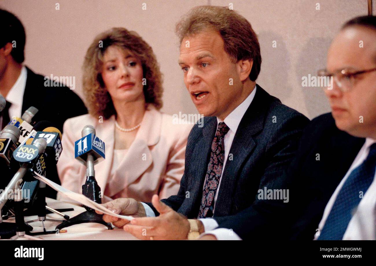 With his wife Laurel looking on, psychologist Dr. L. Jerome Oziel