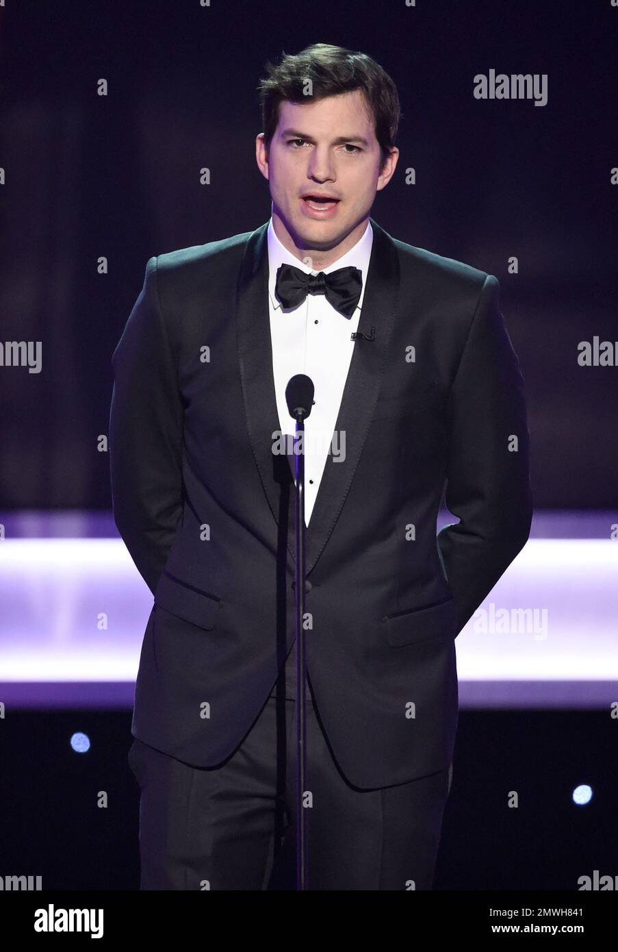Ashton Kutcher presents the award for outstanding performance by a ...