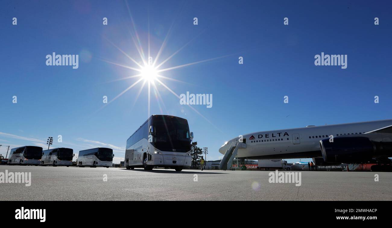 Buses Carrying The Atlanta Falcons Leave George Bush Intercontinental ...