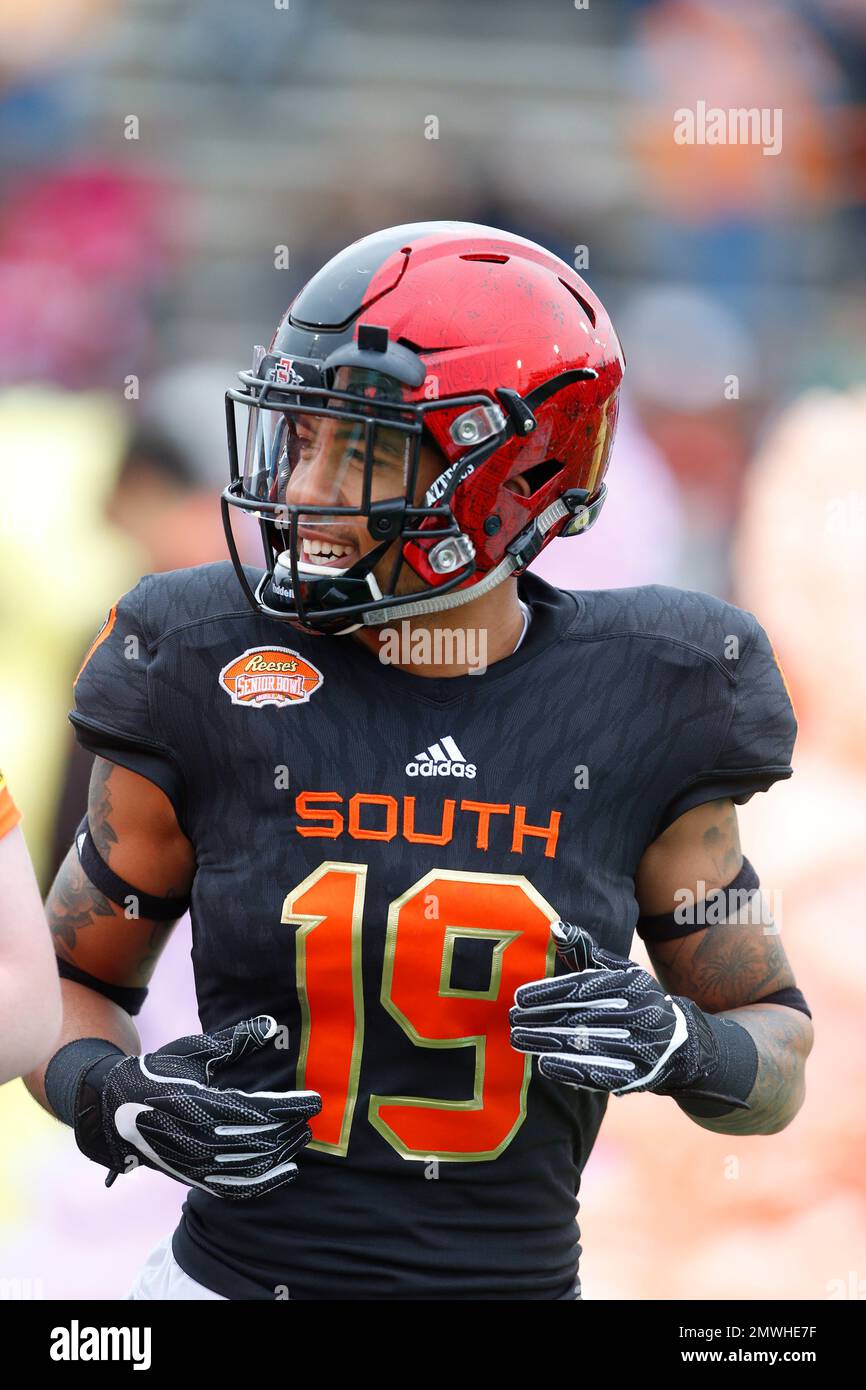 South squad running back Donnel Pumphrey of San Diego State, center is  tackled during the first half of the Senior Bowl NCAA college football game  against North, Saturday, Jan. 28, 2017, at