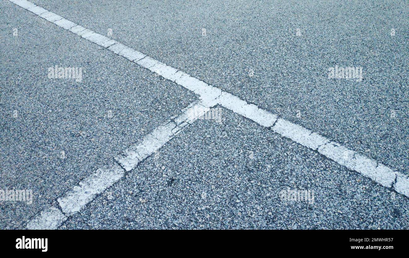Surface of asphalt with a white line. Seamless tarmac gray road