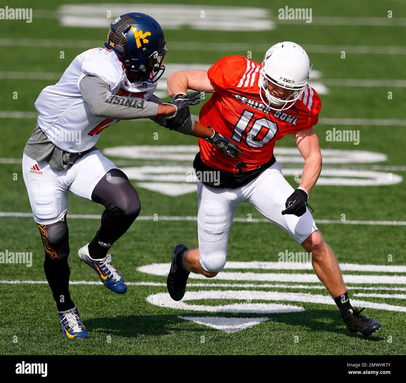 Washington's Cooper Kupp, right, and Virginia's Rasul Douglas, left ...