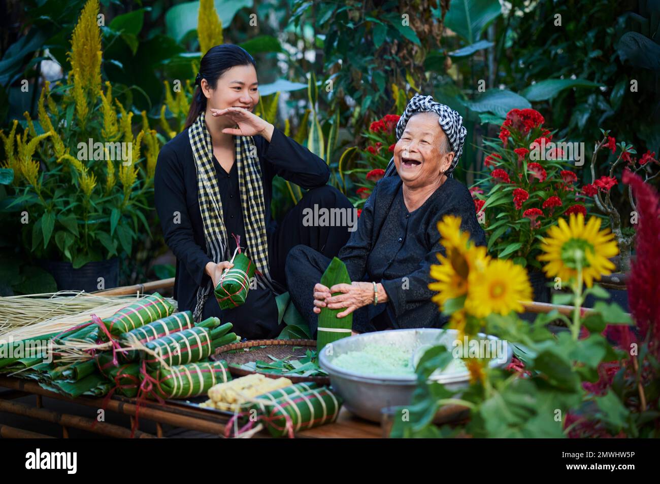 Ho Chi Minh City, Vietnam- January 12, 2023: Vietnamese family reunion scene on traditional Tet holiday Stock Photo