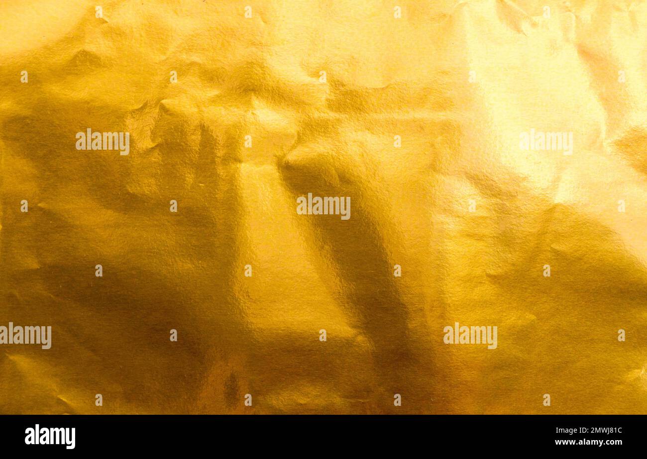 https://c8.alamy.com/comp/2MWJ81C/bright-yellow-texture-of-gold-foil-or-leaf-as-a-background-2MWJ81C.jpg