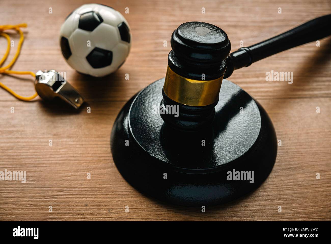 Law and soccer sport.Football coach accused. Concussion lawsuit. Stock Photo