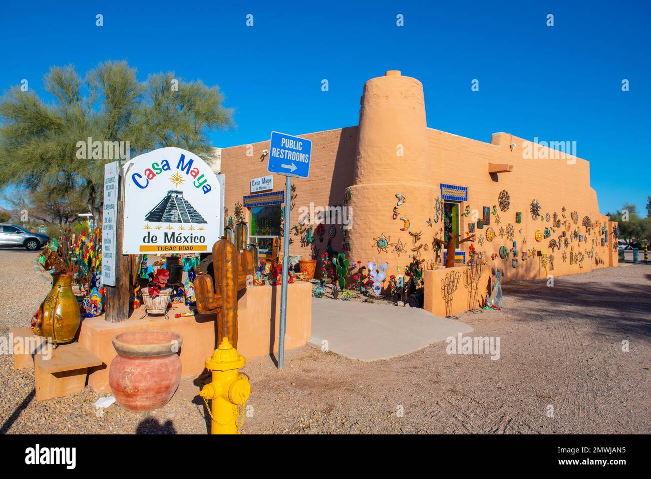 Historic adobe style buildings featured with handcraft arts around