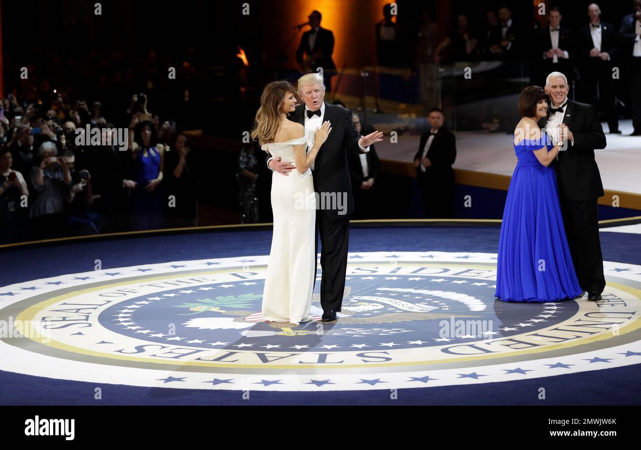 President Donald J. Trump dances with first lady Melania Trump at The
