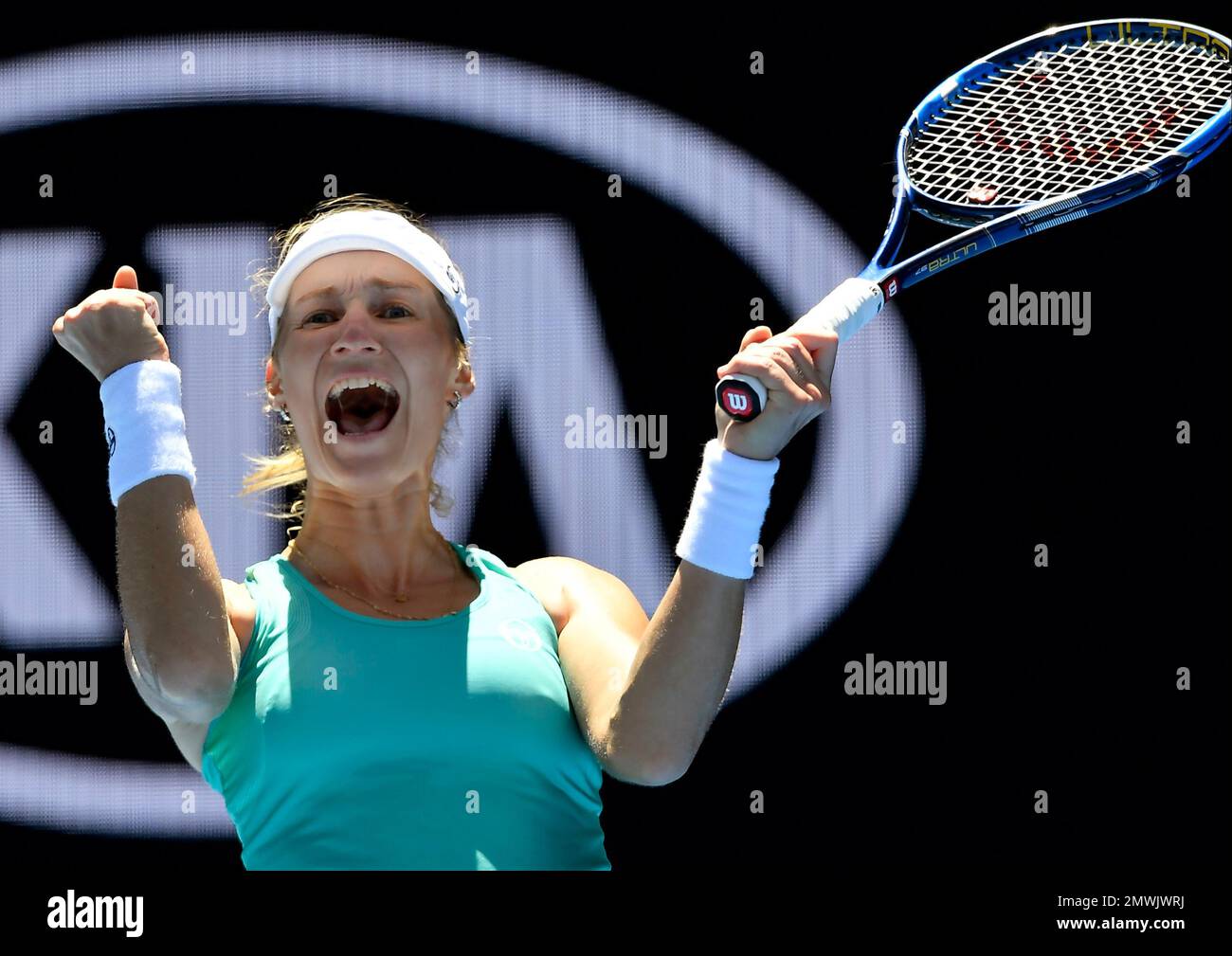 Russia's Ekaterina Makarova celebrates after defeating Slovakia's
