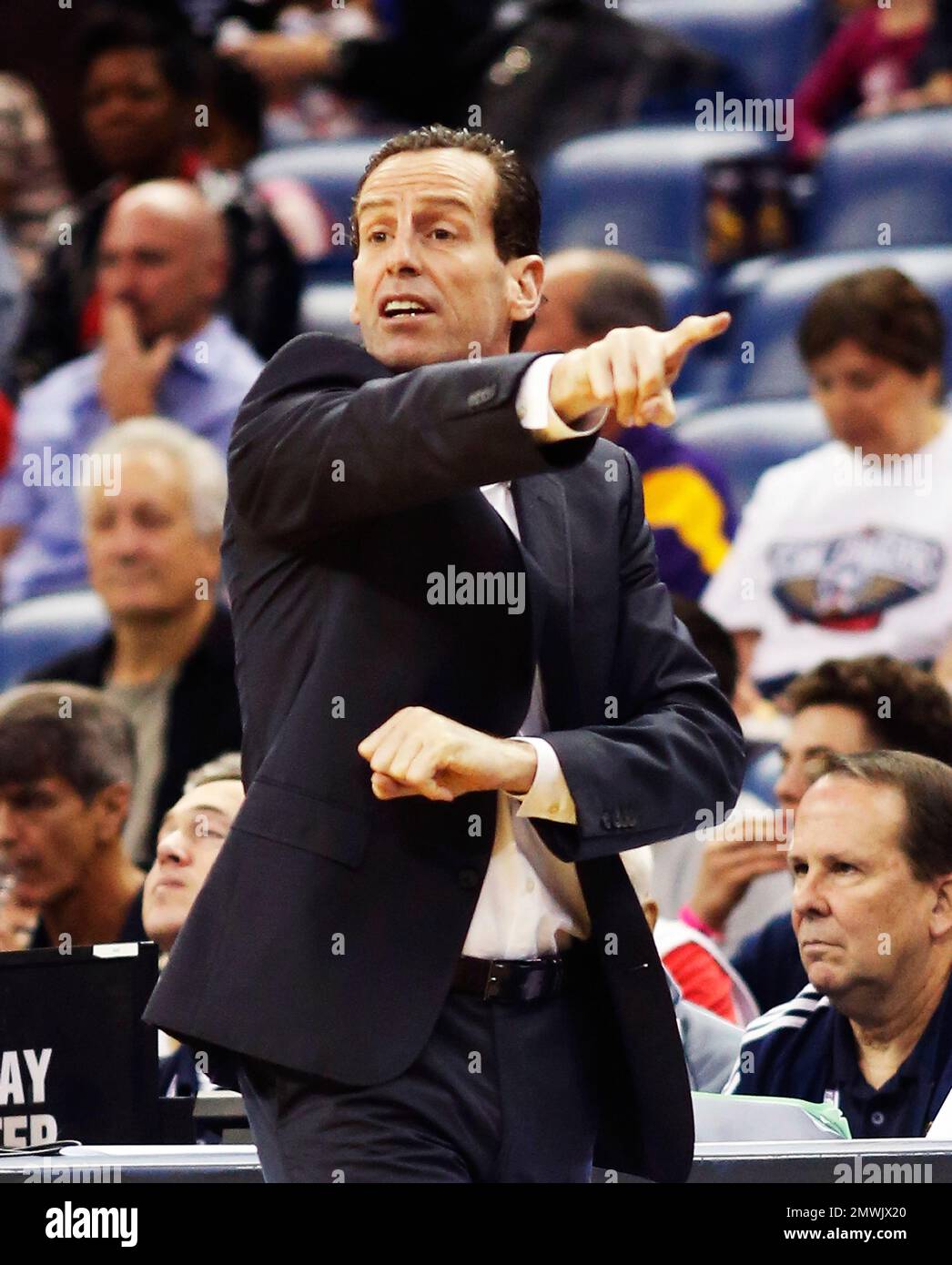 Brooklyn Nets coach Kenny Atkinson gestures to his team during the