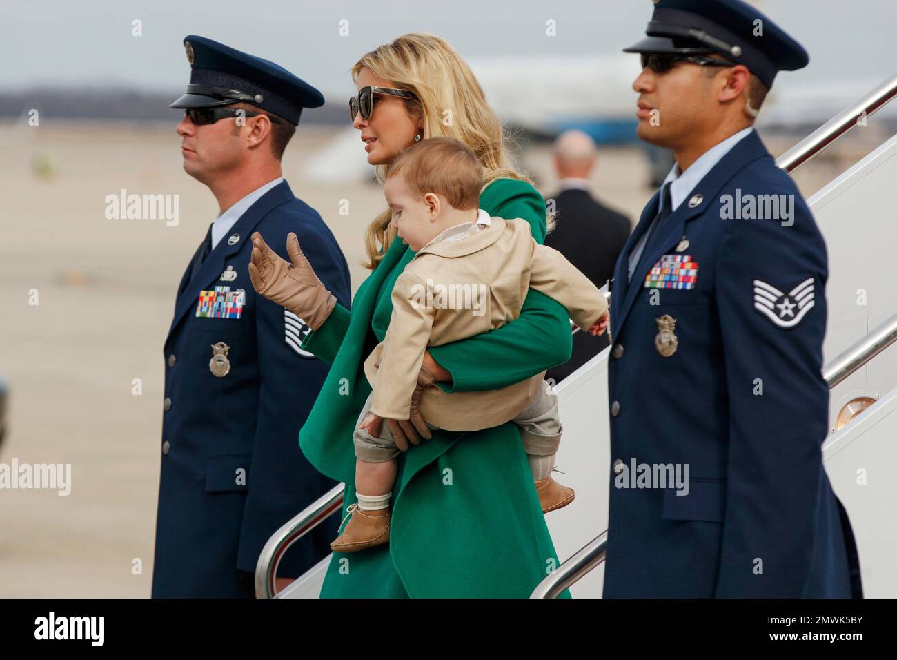 Ivanka Trump carries her son Theodore Kushner, as they arrive at