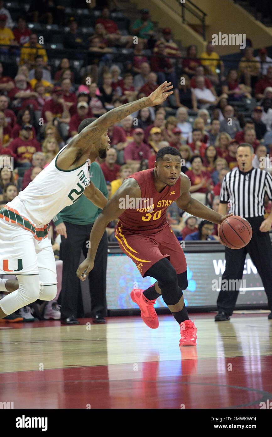 Iowa State guard Deonte Burton (30) drives to the basket in front of