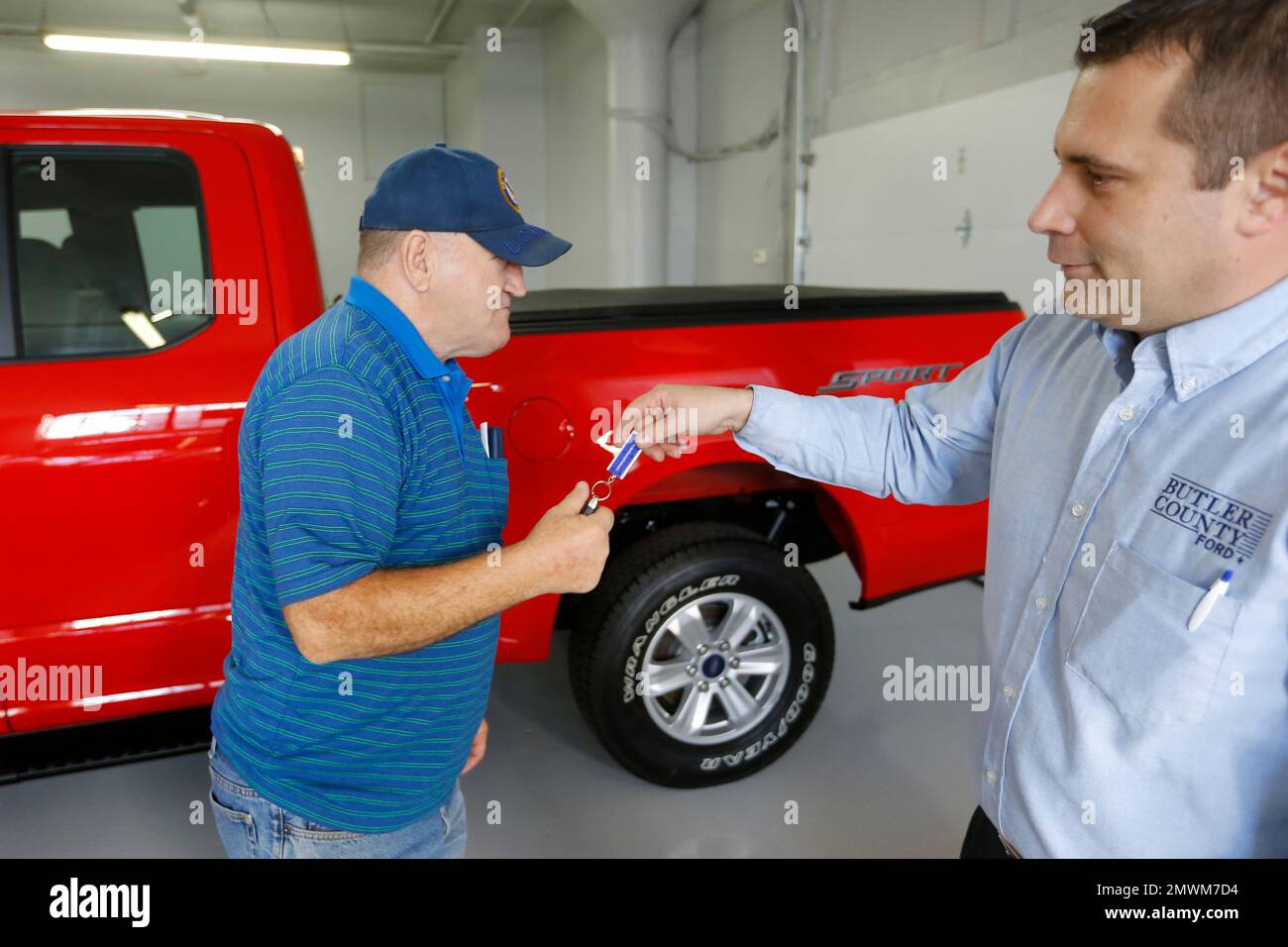 FILE In this Thursday, Nov. 19, 2015, file photo, Alton John, left, from Kittanning, Pa., gets