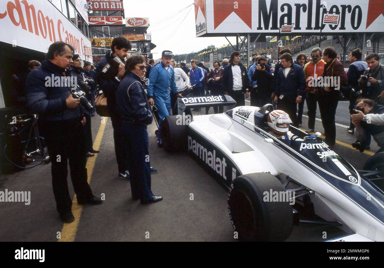 Bernnie Eccestone watches Nelson Piquet leave the Pits at the Belgium Grand Prix 1982 at Zolder Stock Photo