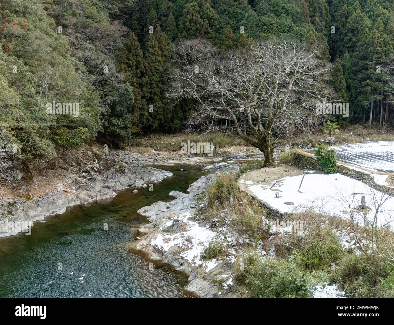 The Kumozu River (Kumozugawa) in Tsu City, Mie Prefecture, Japan, seen from a train on the JR Central Meisho Line. Stock Photo