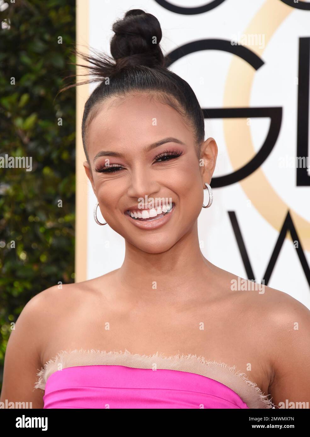 Karrueche Tran arrives at the 74th annual Golden Globe Awards at the