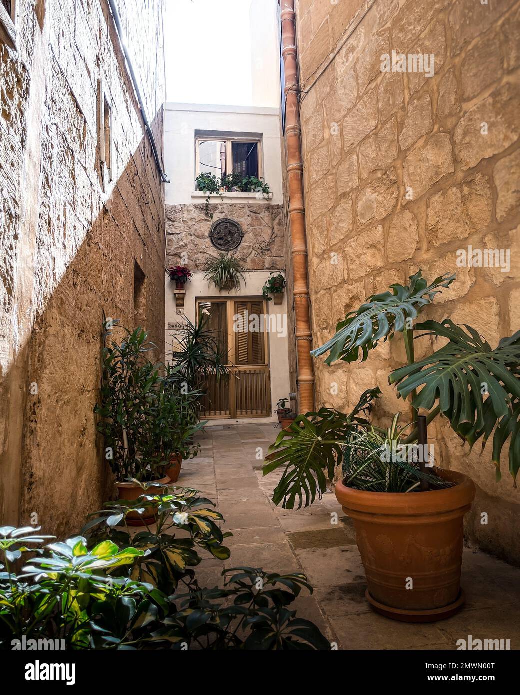 A vertical shot of the narrow streets and ancient buildings Stock Photo ...