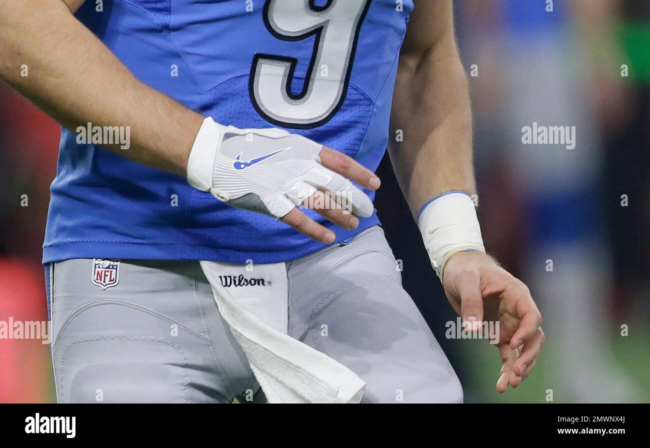 Closeup of Detroit Lions quarterback Matthew Stafford's throwing glove