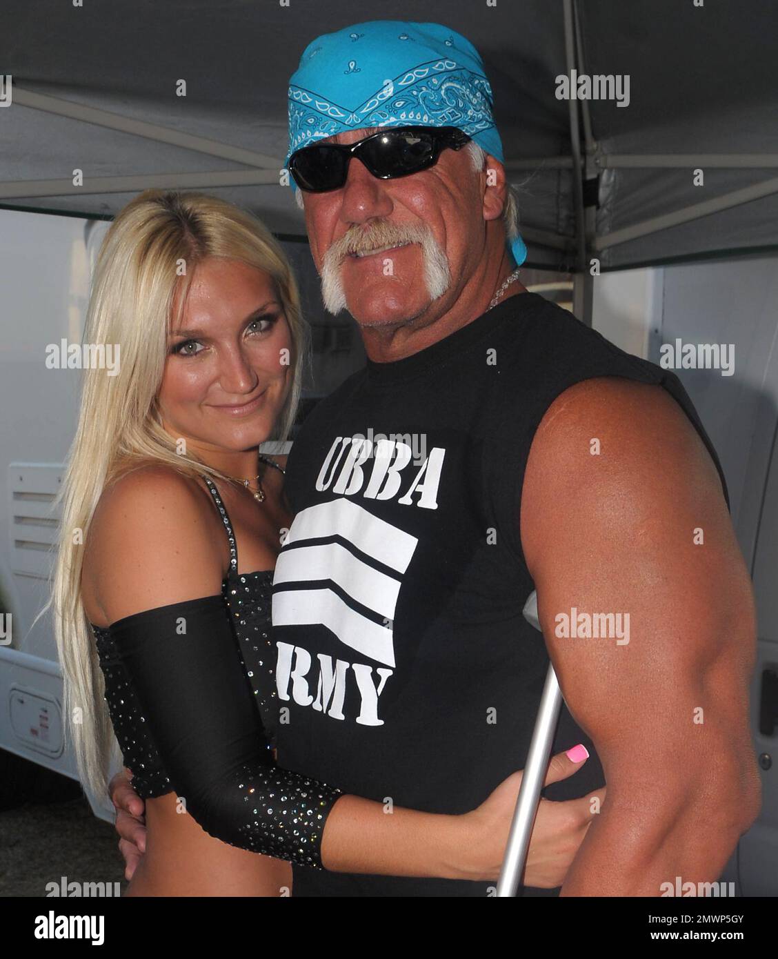 Miami, United States Of America. 15th Mar, 2009. MIAMI - FL - MARCH 15; Hulk Hogan (AKA Terry Gene Bollea) backstage after Brooke Hogans performace at the Calle Ocho carnival. The Hulk was seen with on crutches after he was injured at the court house fighting with his x wifes lawyer. the hulk also had only one crutch after the other was was stolen from him at the airport. On March 15, 2009 in Miami Florida People: Brooke Hogan, Hulk Hogan Transmission Ref: FLXX Must call if interested Michael Storms Credit: Storms Media Group/Alamy Live News Stock Photo
