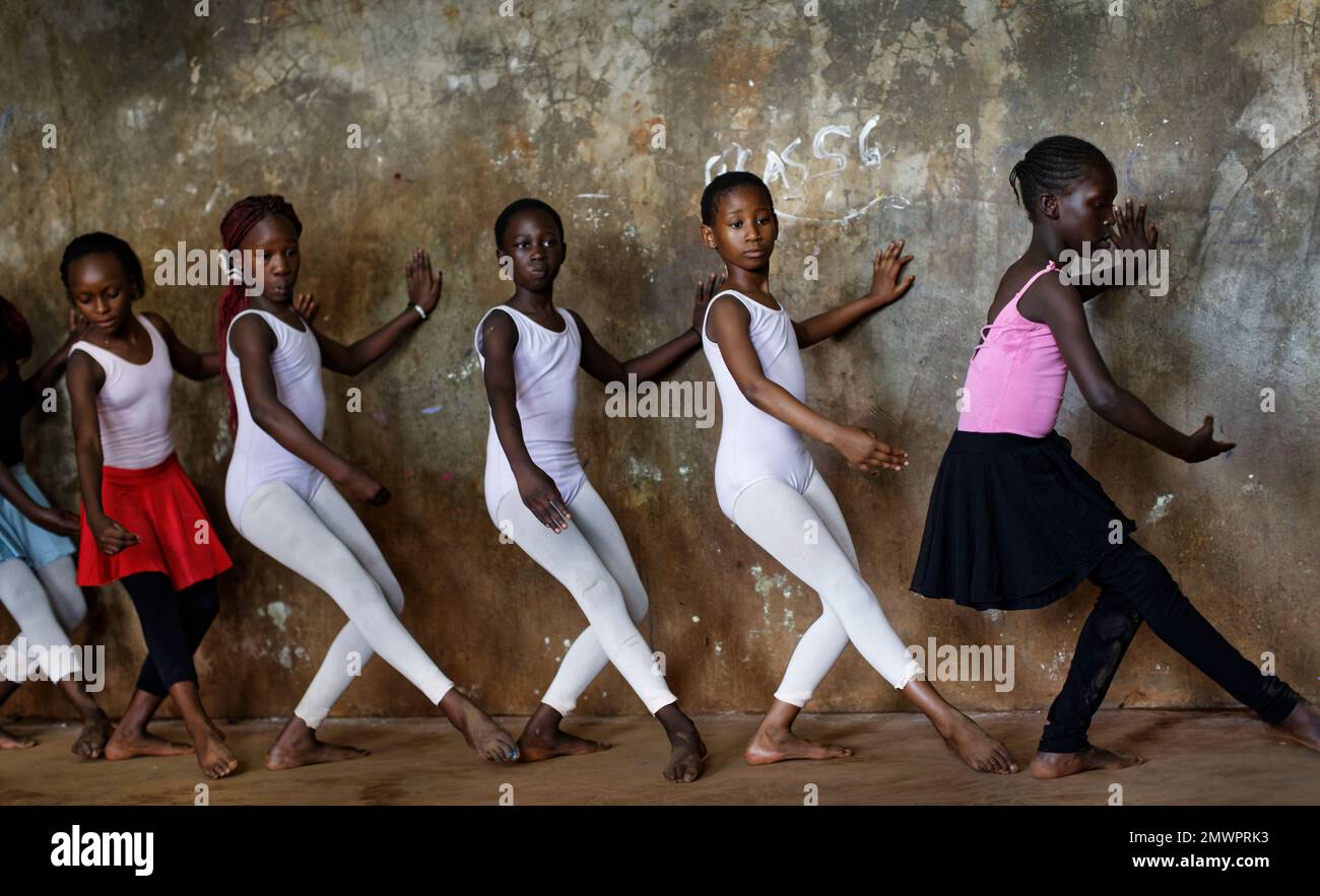 In this photo taken Friday, Dec. 9, 2016, young ballerinas practice