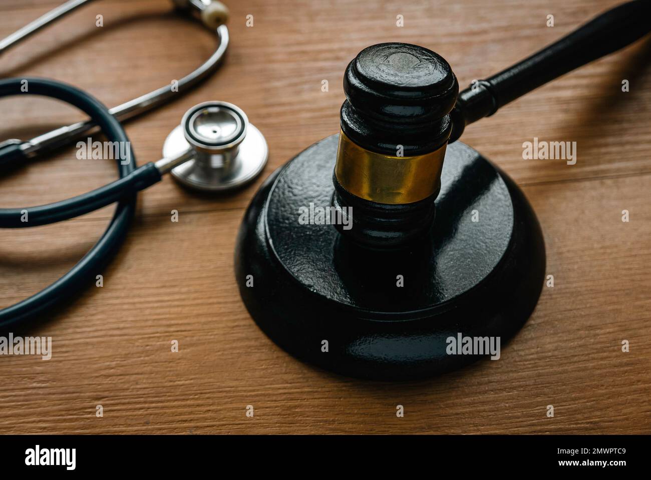 Law in healthcare and medical. Medical malpractice, personal injury law.Judgement of common mistakes made by nurses,doctors or hospital. Gavel and ste Stock Photo