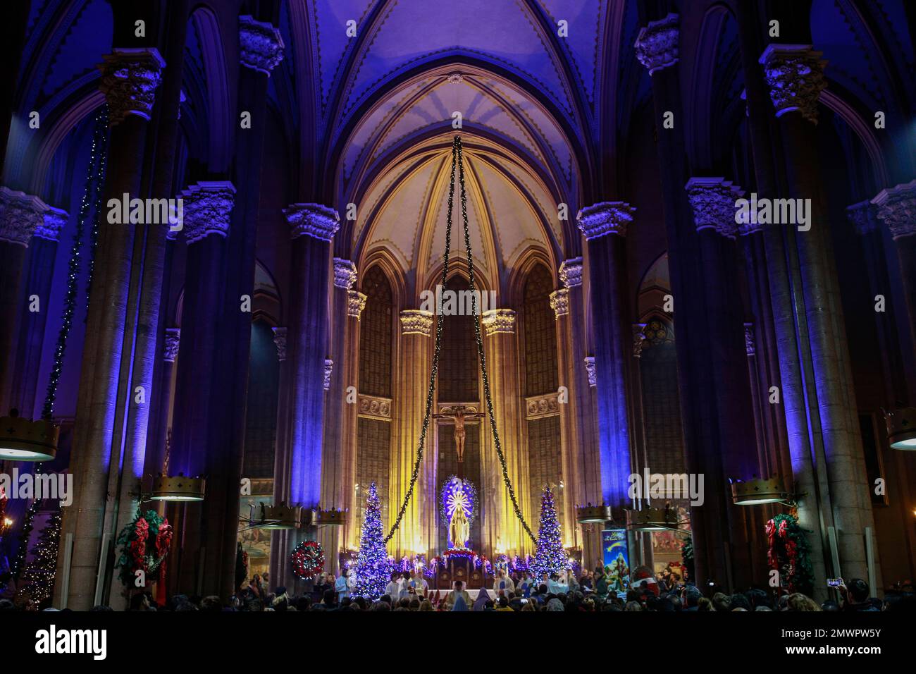 Catholic christians participate at a Christmas Eve mass in Sent Antuan ...