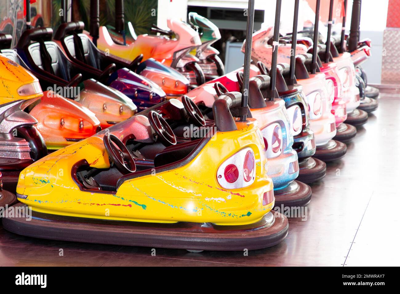Colorful electric bumper car in autodrom in the fairground attractions