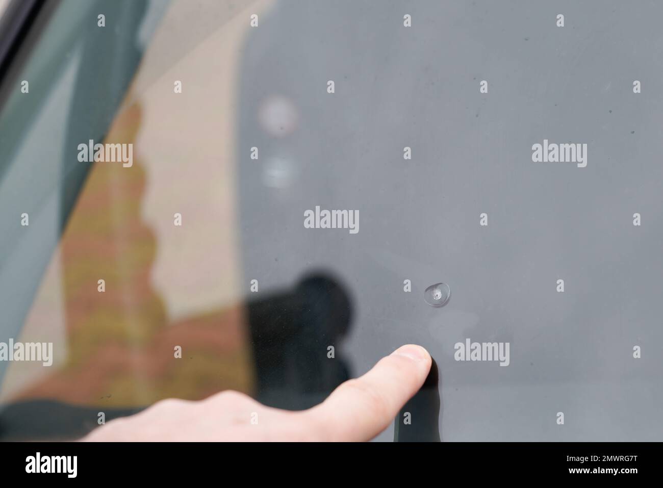 Broken car impact automotive windshield glass Smashed windscreen of motorcar cracked glass with