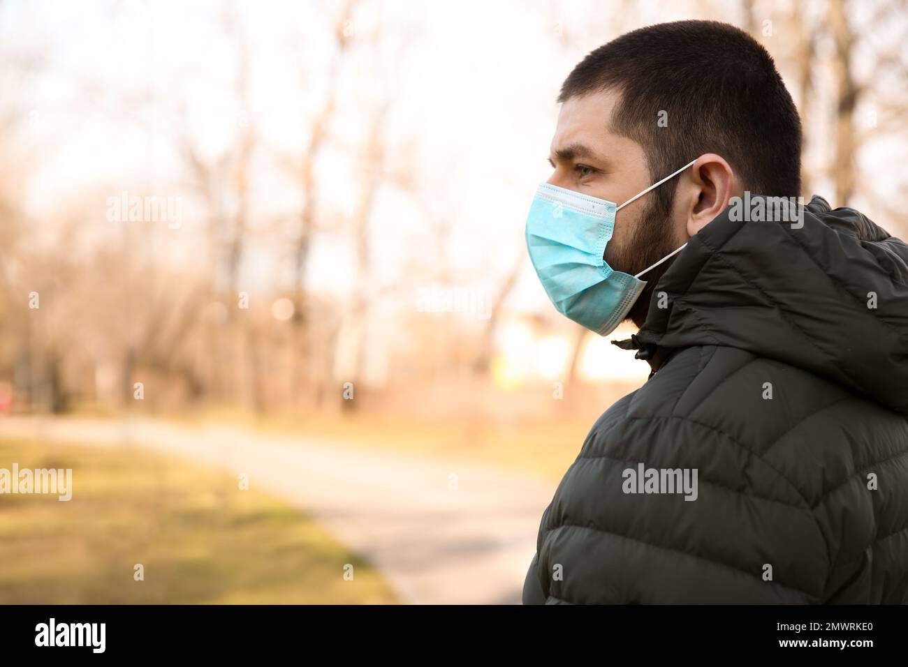 Man wearing disposable mask outdoors. Dangerous virus Stock Photo Alamy