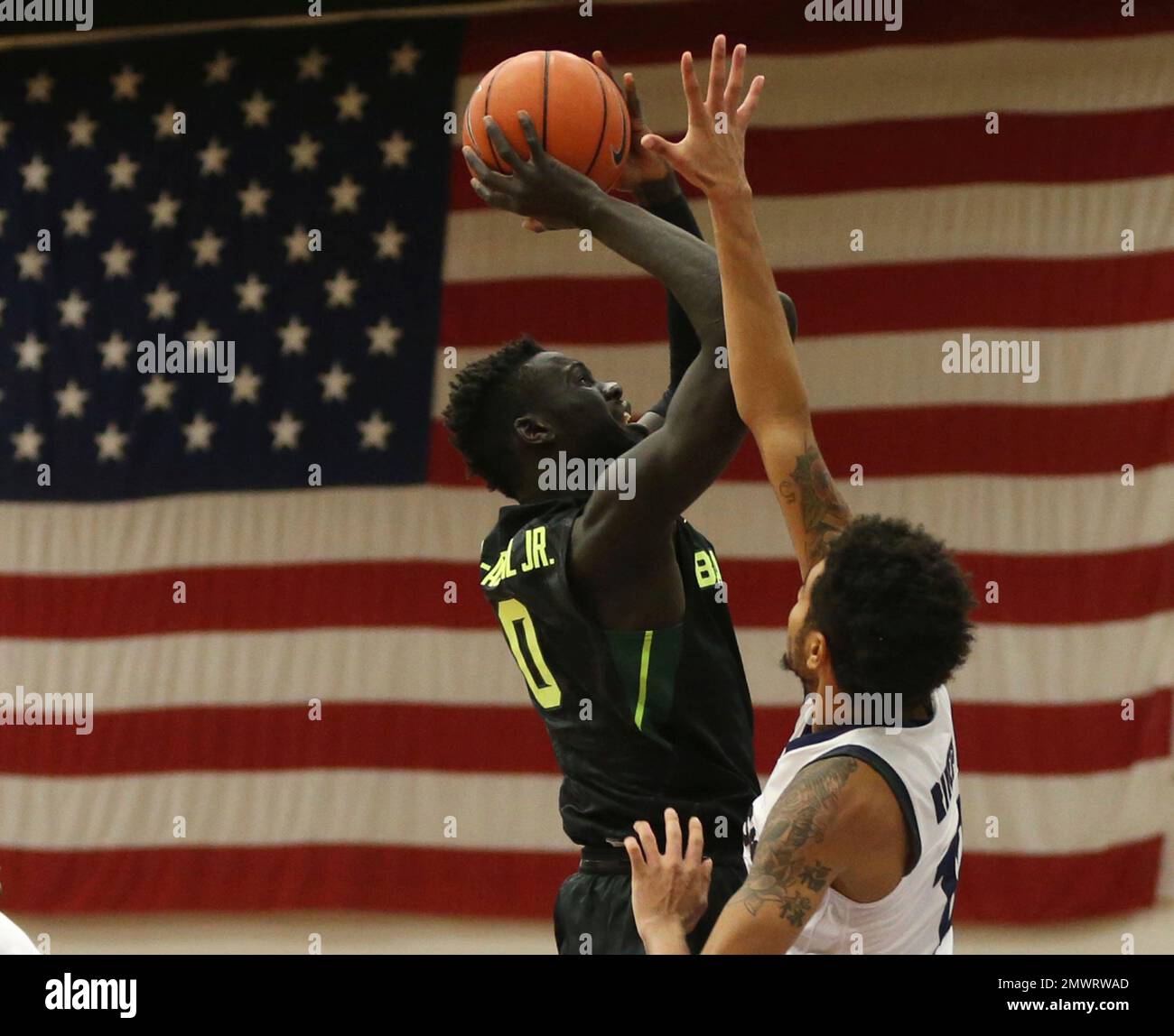 Baylor forward Jo LualAcuil Jr. left, scores over Jackson State